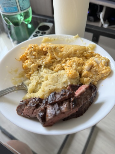 steak and eggs with mashed potatoes
