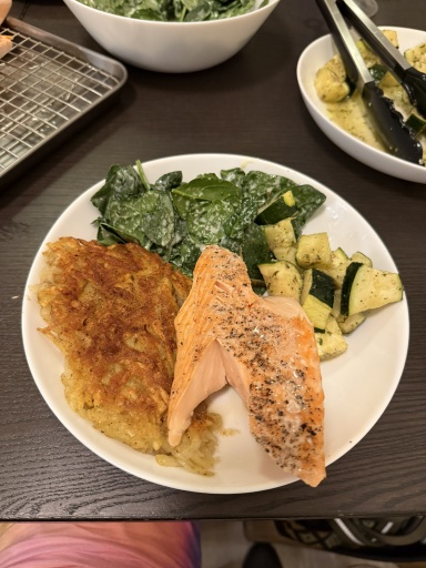 salmon with hash browns and vegetables