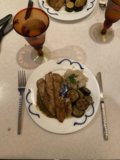 pan-fried fish with zucchini and mashed potatoes