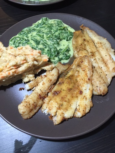 pan-fried fish with creamed spinach