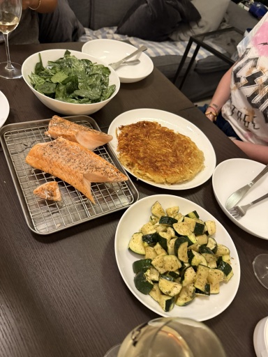 salmon with hash browns and vegetables