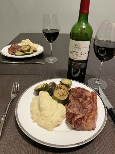 steak with mashed potatoes and zucchini