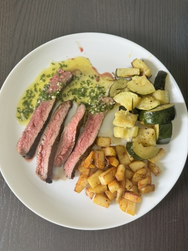 steak with potatoes and zucchini