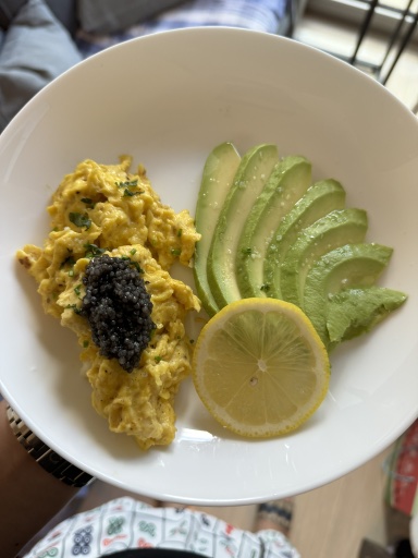 scrambled eggs with caviar and avocado