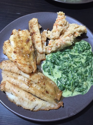 pan-fried fish with creamed spinach