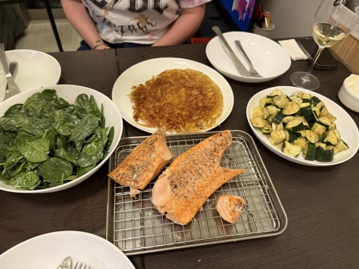 salmon with hash browns and vegetables