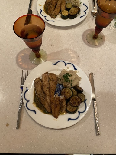 pan-fried fish with zucchini and mashed potatoes