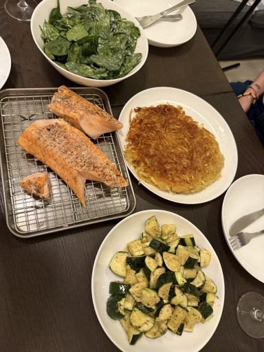 salmon with hash browns and vegetables