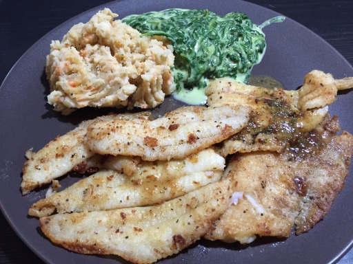 pan-fried fish with creamed spinach