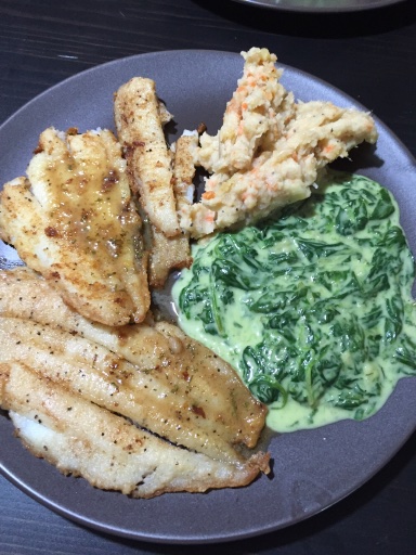 pan-fried fish with creamed spinach