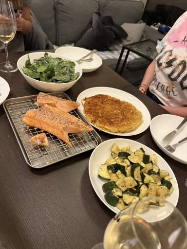 salmon with hash browns and vegetables